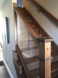 birch hardwood stairs and railings along with glass panel